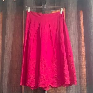 Pink skirt with eyelet floral design